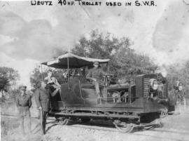 South-West Africa. Four uniformed men with 40 horsepower Deutz trolley.
