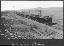 Estcourt district, circa 1925. Train double-headed by electrical locomotives at Willowford statio...