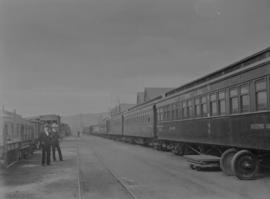Rack of CSAR Train Deluxe coaches with staff.