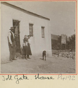 Toll gate keeper and family at toll house.