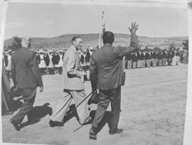 Alice, 1 March 1947. King George VI walking and talking at Lovedale College with school children ...
