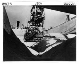 Durban, 1971. Sugar being loaded in bulk onto ship in Durban Harbour.