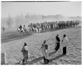 Basutoland, 12 March 1947. Mounted Basutos riding to the Pitso tribal meeting, watched by some lo...