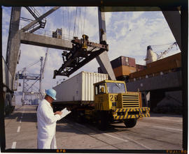 Durban, July 1986. Container loaded onto road truck. [Z Crafford]