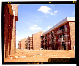 Bapsfontein, August 1982. Hostel complex under construction at Sentrarand. [T Robberts]