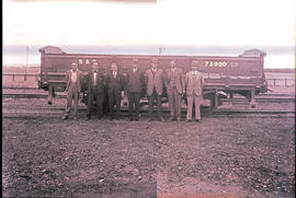 
SAR drop-sided all steel wagon Type ES-4 No 72000 with dignitaries posing.
