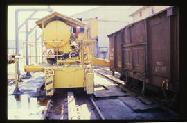 Specialised equipment wagon on railway tracks.