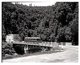Plettenberg Bay, 1965. SAR Mercedes Benz tour bus crossing Bloukrans River.