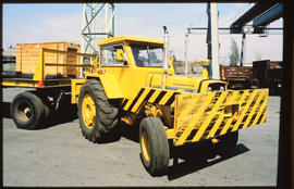 Johannesburg, November 1986. SAR Massey Ferguson tractor with trailer handling cargo at Kaserne. ...