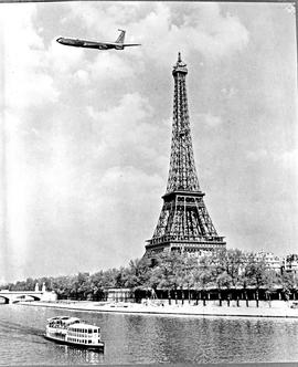 Paris, France, 1963. SAA Boeing 707 flying over the Eiffel tower.