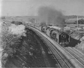 Springfontein, 1960. Passenger train double-headed by SAR Class 23.