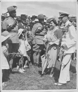 
Queen Elizabeth and King George VI greeting crowd.
