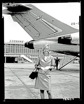 Johannesburg, 1968. Jan Smuts airport. SAA Boeing 727 ZS-DYO 'Vaal'. Hostess standing next to tail.