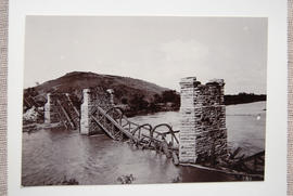 Circa 1901. Damaged bridge.