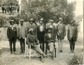 Walvis Bay, 1925. Construction of harbour. Group of nine black men.