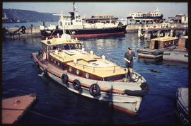 SAR Police boat in harbour with SAR pilot boat 'RP Jacson' behind.