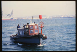 Durban, 1984. Small boat in Durban Harbour.