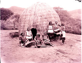 "Pietermaritzburg district, 1966. Zulu group at traditional hut."
