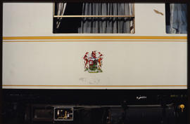 February 1995. Close up view of national coat of arms on side of railway coach. (White Train?)