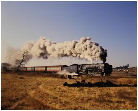 Fouriesburg district, 1987. SAR Class 25NC with burst of steam. [D Dannhauser]