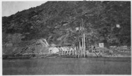 Wilderness, circa 1926. Kaaimans River bridge construction: Driving piles for temporary bridge. (...
