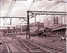 Johannesburg, 1948. SAR Class 15F with Blue Train leaving.