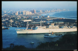 Durban. SAR tug escorting ship into Durban Harbour.