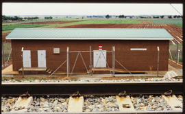 November 1987. Electrical substation next to railway tracks.