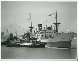 East London, 1957. Tug 'F Schermbrucker' with 'City of Pretoria' in Buffalo harbour.