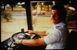 Driver at work in SAR tour bus.