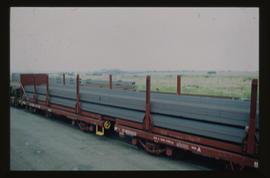 Witbank, 1981. SAR type SF-1double wagon loaded with profiled steel beams. [Ria Liebenberg]