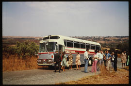 
SAR Silver Eagle tour bus No MT60025 with passengers at roadside stop.
