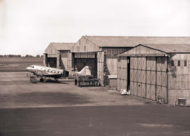 Johannesburg, 1948. Palmietfontein Airport. SAA Douglas DC-3 ZS-AVJ 'Paardeberg' in front of hangar.