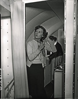 
SAA Lockheed Constellation interior. Hostess, cabin crew.
