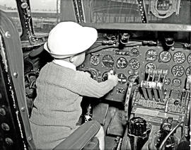 Johannesburg, 1955. Jan Smuts airport. Cockpit of SAA Lockheed Constellation ZS-DBU 'Durban', lit...