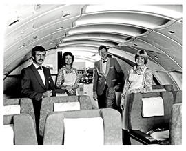
SAA Boeing 747SP interior. Cabin service. Steward and hostess. Upper deck.  Possibly part of the...