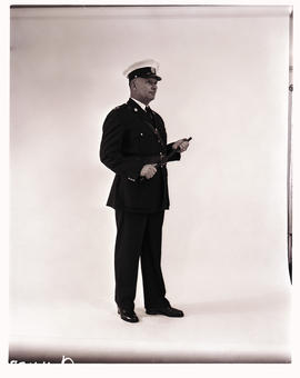 
SAR. Police officer showing uniform.
