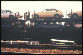 October, 1980. Motor car train with SAR type SCL-4 wagons. Opel car. [De Waal Louw]