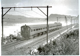 Cape Town, 1928. Sea Point electric motor coach train near Muizenberg.