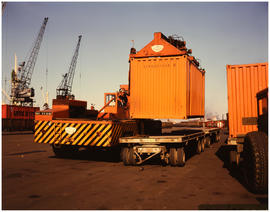 Cape Town, September 1974. Container being lifted onto low bed trailer.