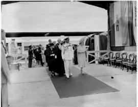 
King George VI and Queen Elizabeth at station.
