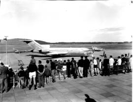 Durban, 1967. Louis Botha airport. SAA Boeing 727 ZS-DYO 'Vaal' on apron with SAAF Mirage III CZ ...