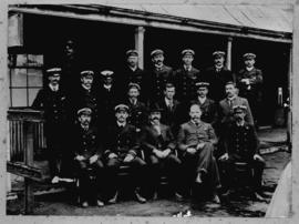 Durban, circa 1890. Stationmaster J McConnachie in centre with staff at Point station.