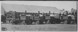 Johannesburg. Four Thornycroft tractors at old Kazerne with trailers loaded with bags. See N17059.
