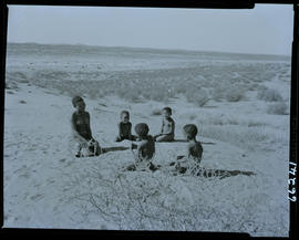 Kalahari, 1957. Young Bushmen boys on sand dune.