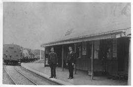 Dohne, 1895. Two railwaymen posing in front of corrugated iron station building. (EH Short)