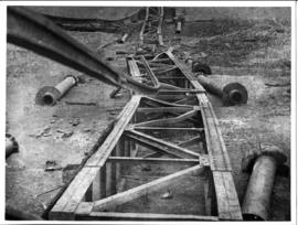 Circa 1902. Construction Durban - Mtubatuba: Damaged bridge spans of the Umsindusi River bridge a...