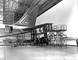 
SAA Boeing 707 ZS-CKC 'Johannesburg' being worked on in hangar.
