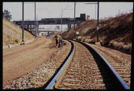Bapsfontein, August 1982. Ballasting the line into Sentrarand marshalling yard. [T Robberts]