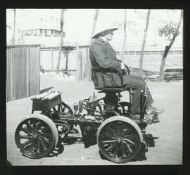 Frank Dutton on motorised trolley.